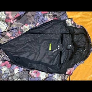 Nike size L windbreaker jacket with floral design new with tags